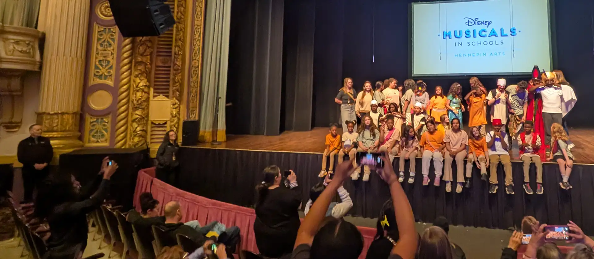 Photo of kids on stage after a play.
